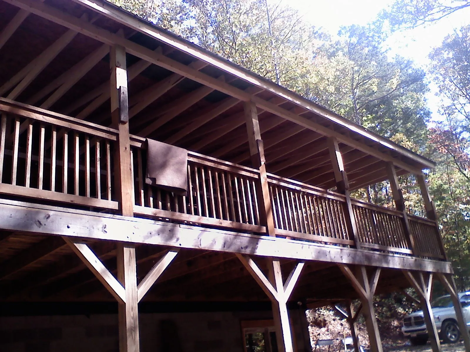 Timber framing under a new elevated porch and deck — Roof Leak Repair in Germantown by Roofing Brothers